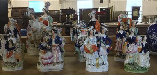 11 Victorian Staffordshire flatback figurines and spill vases(-)